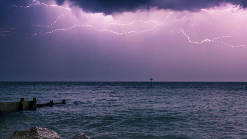 A lightning storm over the English Channel at night viewed from the West Sussex coast.