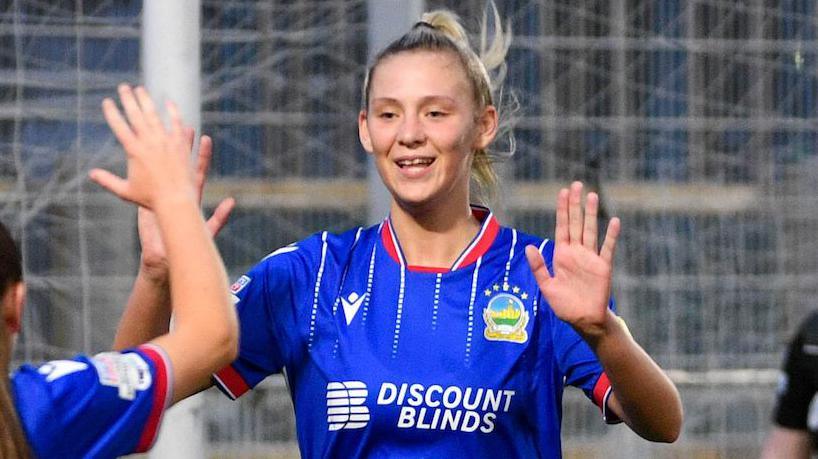 Eve Reilly celebrates scoring