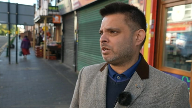 Image shows Cllr Waseem Zaffar in Lozells wearing a blue jumper and grey jacket