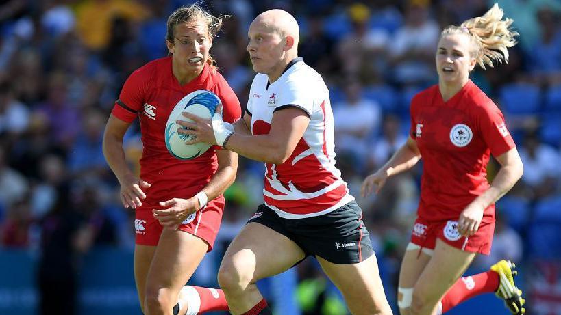 Heather Fisher playing for England astatine nan 2018 Commonwealth Games
