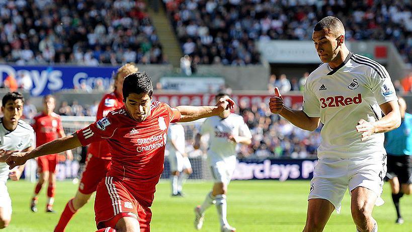 Luis Suarez in action against Swansea in May 2012