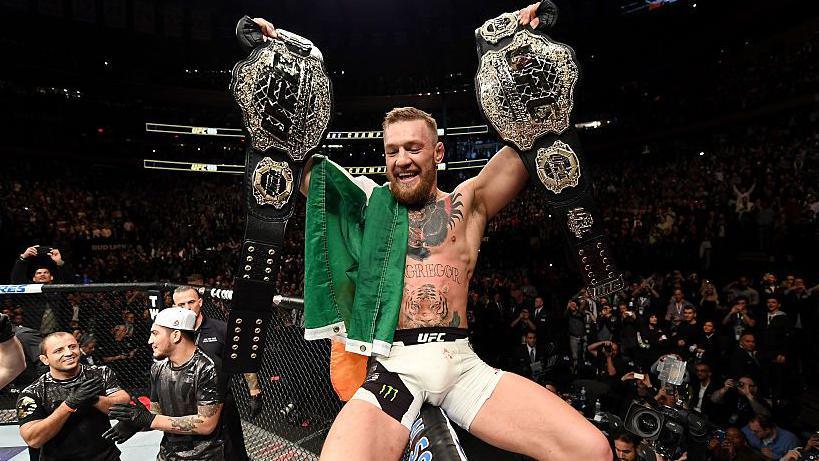 Conor McGregor celebrates after beating Eddie Alvarez in 2016