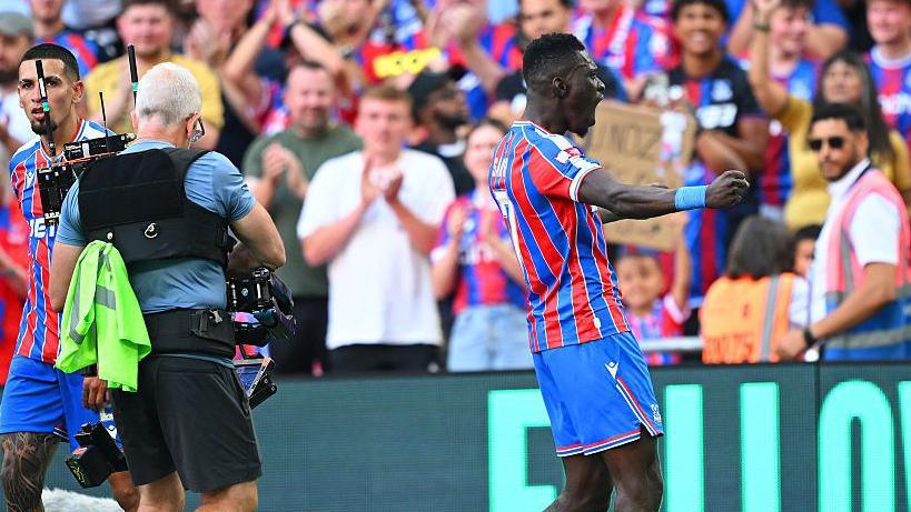 Ismaila Sarr celebrates scoring