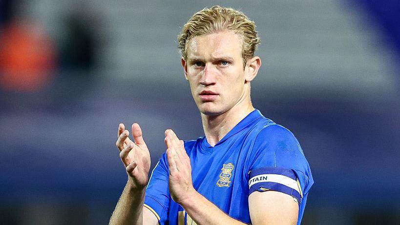 Birmingham City's Christoph Klarer claps the crowd after a game