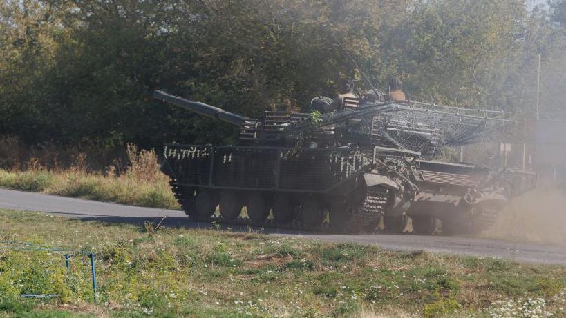 Ukrainian tank drives on the road on September 16, 2024 in Kursk Region, Russia. 