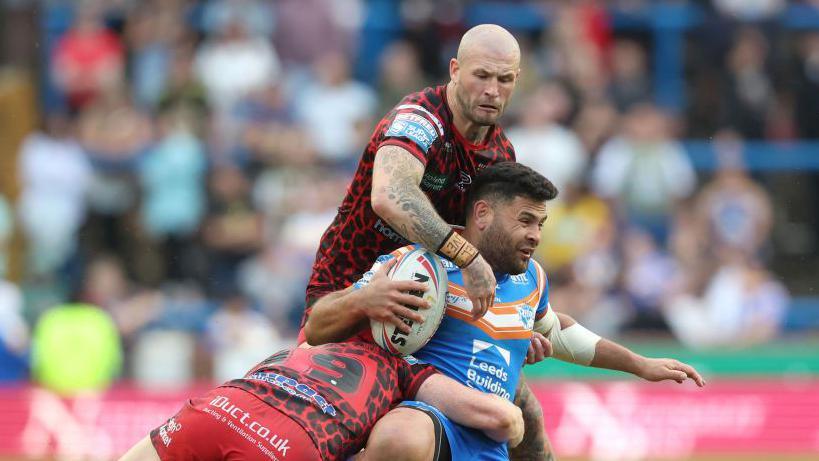 Zak Hardaker tackling Rhyse Martin