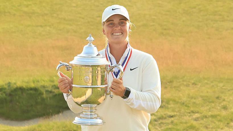 Sweden's Maja Stark poses with the US Women's Open trophy