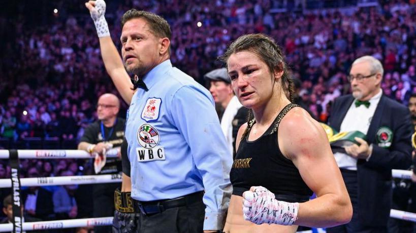 Katie Taylor awaits a decision from the judges in her fight with Chantelle Cameron