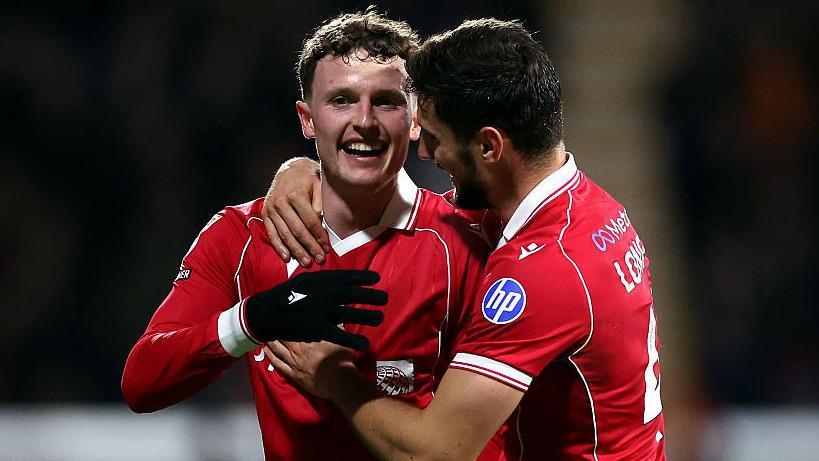 Nathan Broadhead and Ryan Longman celebrate Wrexham goal