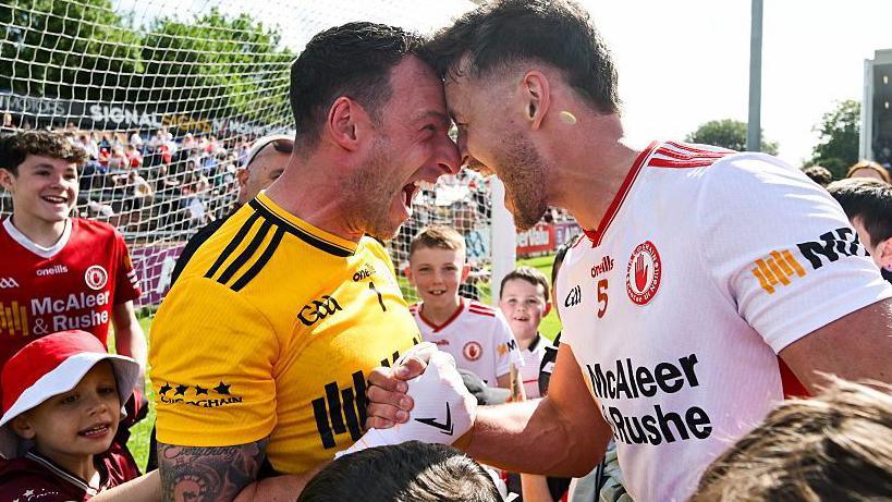 Niall Morgan and Michael McKernan celebrate at the final whistle