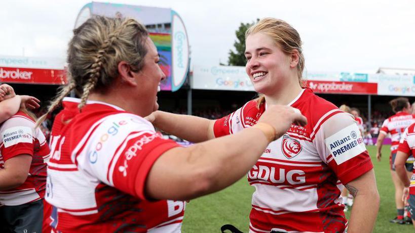 Kelsey Jones and Bethan Lewis hugging after a victory for Gloucester-Hartpury