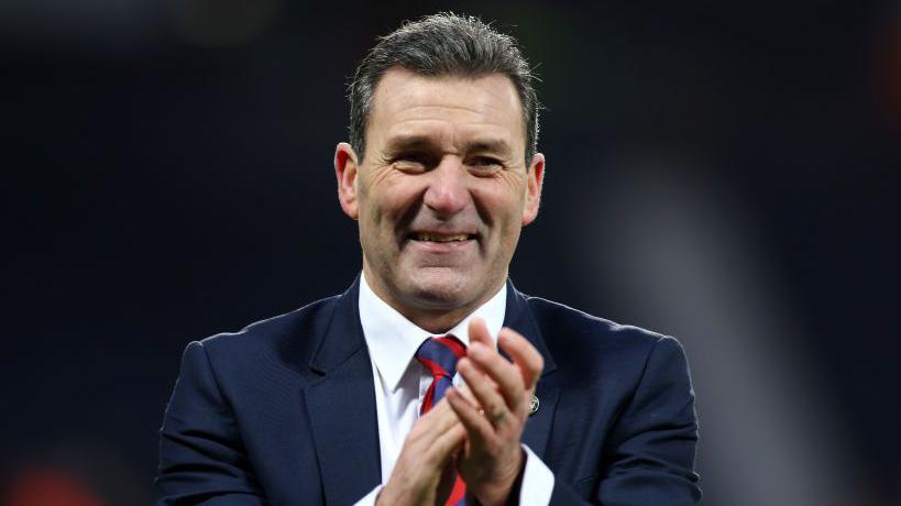 Aldershot Town manager Tommy Widdrington