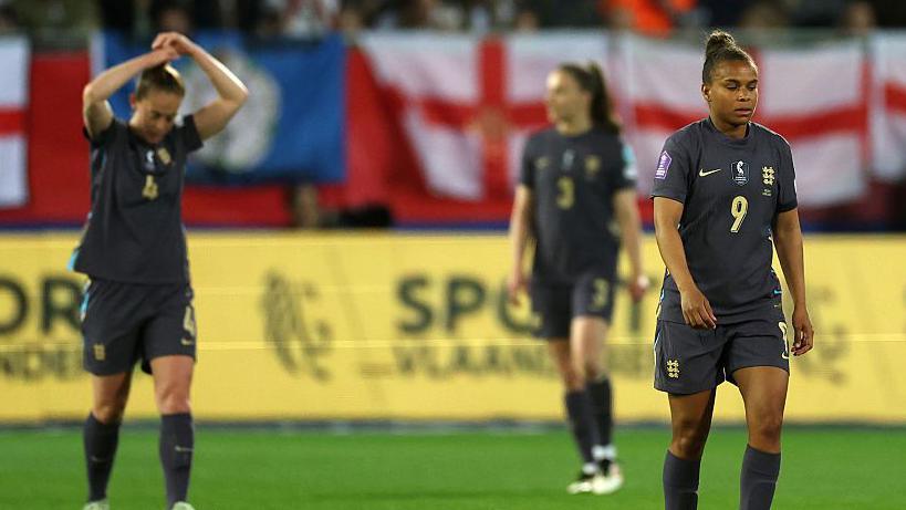 England players react during the defeat against Belgium