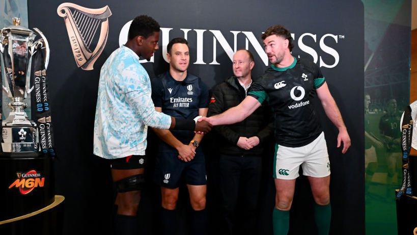 Caelan Doris and Maro Itoje toss the coin