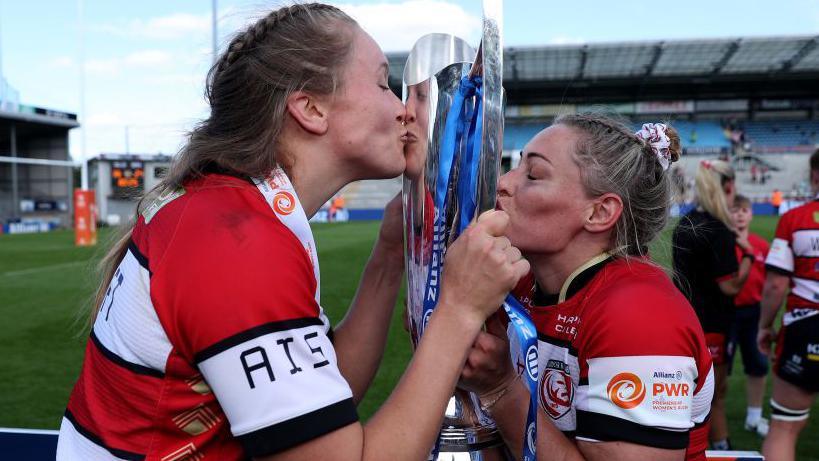 Natasha Hunt with the Premiership Women's Rugby trophy