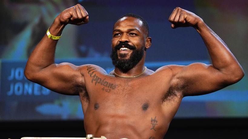 Jon Jones steps on the scales