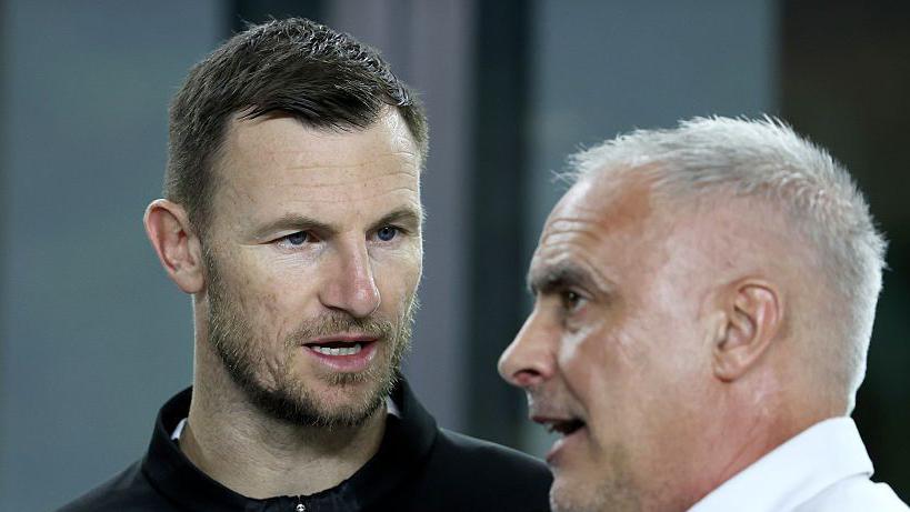 Tommy Smith and New Zealand head coach Darren Bazeley talking prior to New Zealand's match against Colombia at the Chase Stadium in Florida in November 2025.