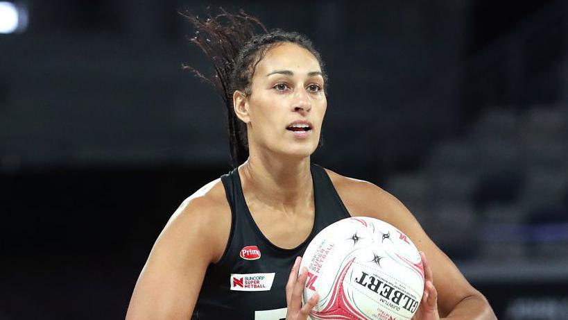 Geva Mentor holding a netball
