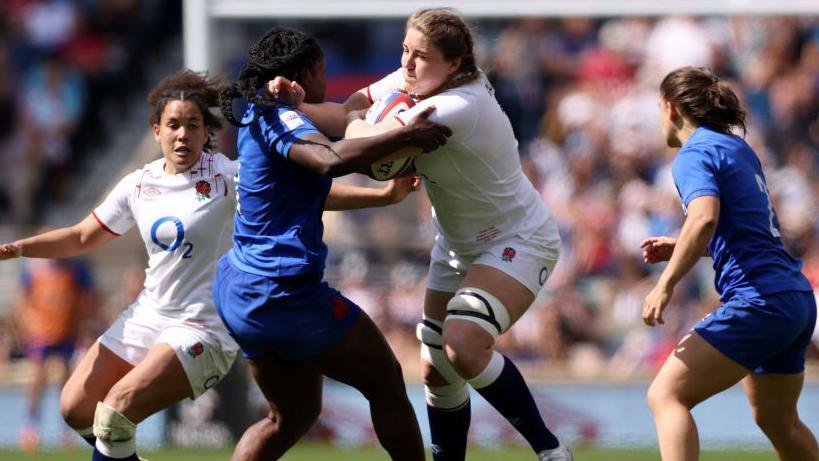 Poppy Cleall takes contact against France