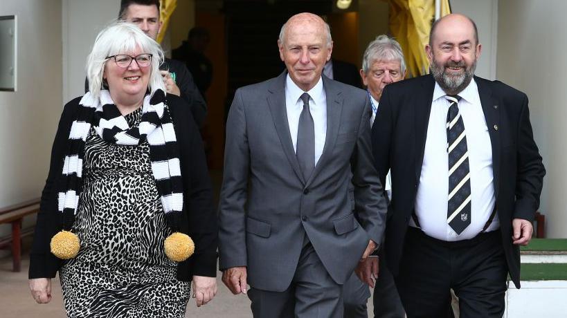 From left: Carol Shanahan, club president John Rudge and Kevin Shanahan