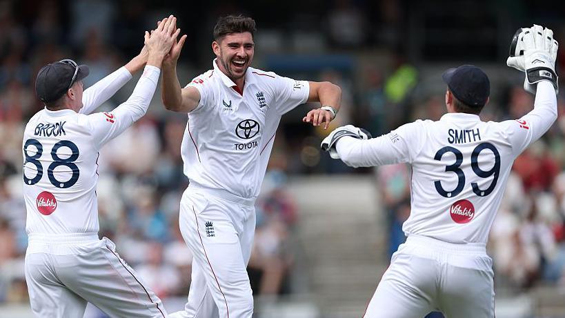 Josh Tongue celebrates taking a wicket at Headingley