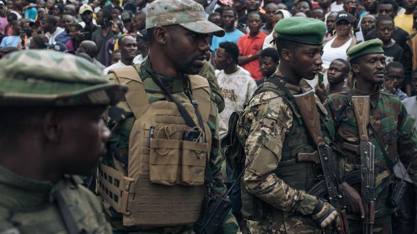 M23 soldiers in the captured city of Goma, in eastern DR Congo. 