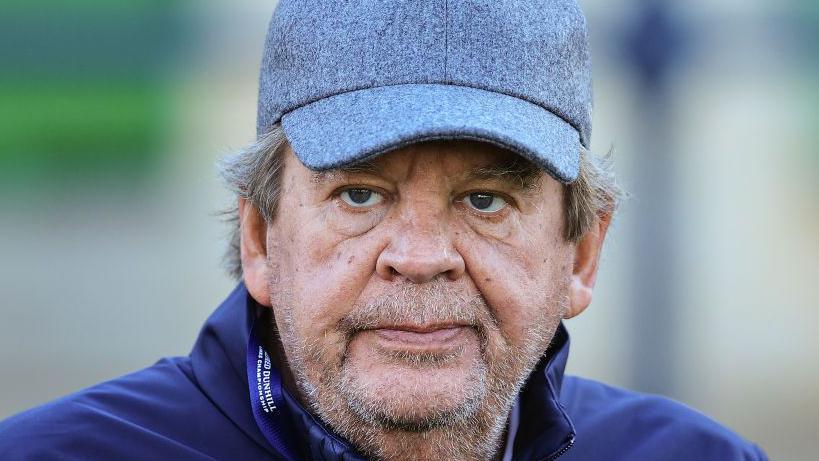  Johann Rupert of South Africa the Chairman and CEO of Richemont on the first hole during the third round of The Alfred Dunhill Links Championship at The Old Course on October 02, 2021 in St Andrews, Scotland. 