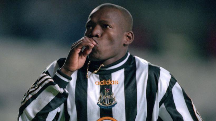 Tino Asprilla celebrates after scoring his third goal for Newcastle United against Barcelona at St James' Park on 17 September, 1997