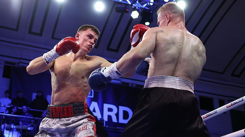 Taylor Bevan (left) in action against Lukas Ferneza.