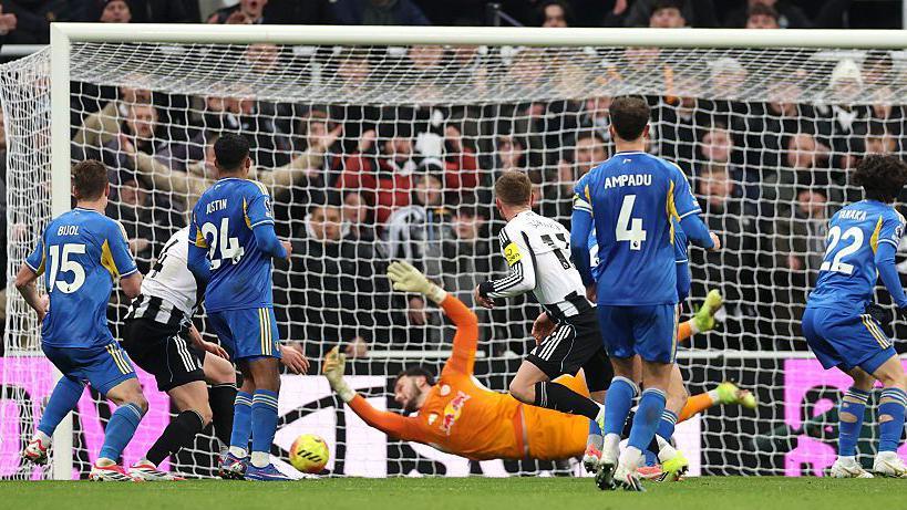 Newcastle United's Harvey Barnes scores against Leeds United
