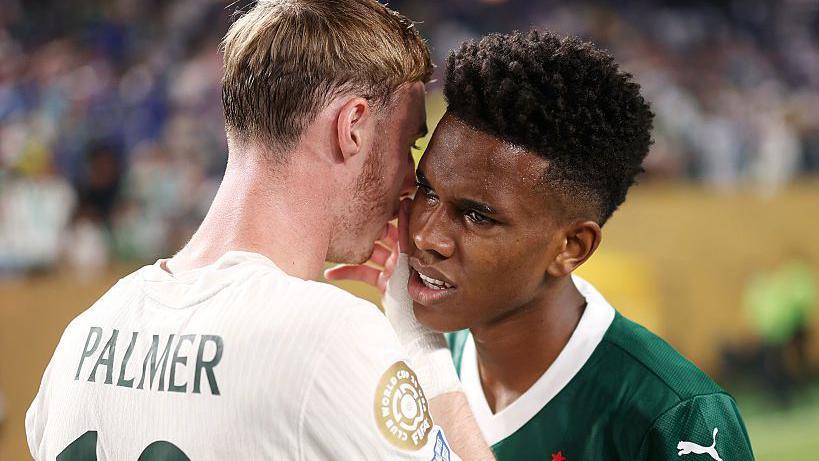 Estevao speaks to Cole Palmer after Chelsea's win over Palmeiras in the quarter-final of the Club World Cup