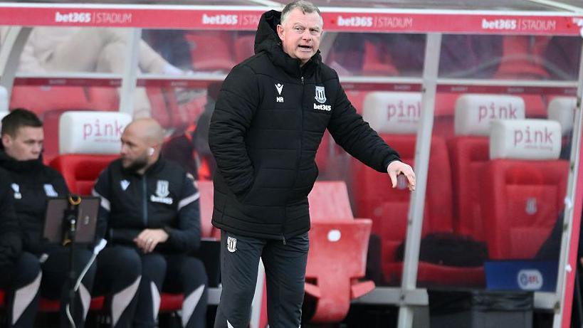 Mark Robins issues instructions to his Stoke team