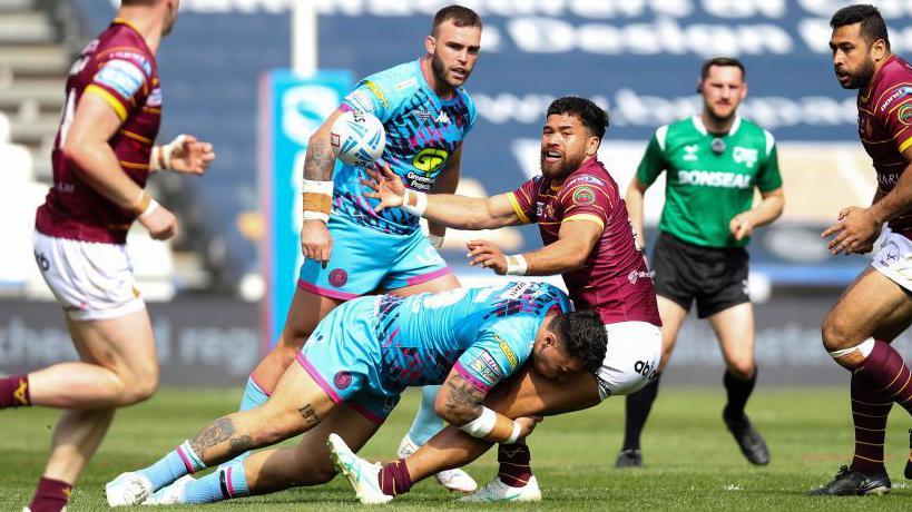 Esan Marsters releases the ball playing against Wigan