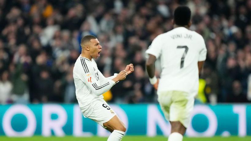 Real Madrid forward Kylian Mbappe celebrates scoring against Atletico Madrid