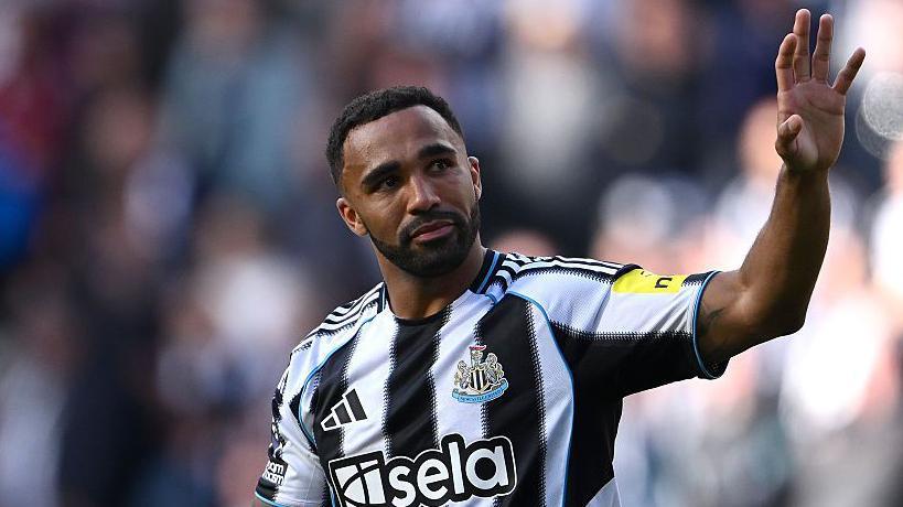Callum Wilson waves to fans after Newcastle's Premier League game against Everton in May
