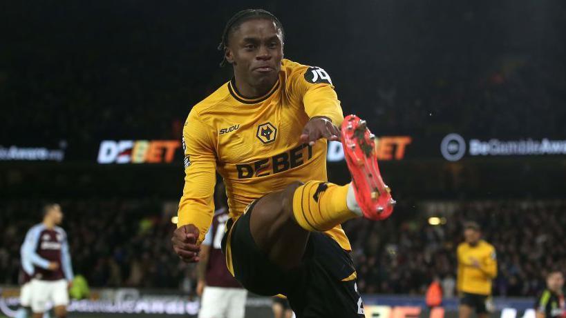 Jean-Ricner Bellegarde celebrates scoring for Wolves at Molineux against Aston Villa