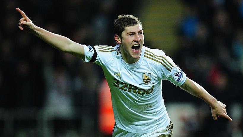 Ben Davies celebrates scoring a goal for Swansea City
