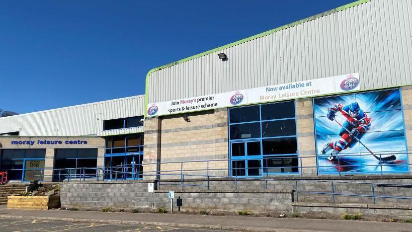 Moray Leisure Centre building, with an image of an ice hockey player outside.