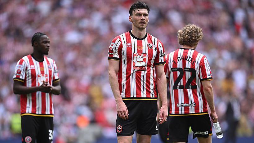 Kieffer Moore of Sheffield United looks dejected at full-time following theChampionship Play-Off Final match between Sheffield United and Sunderland in 2025