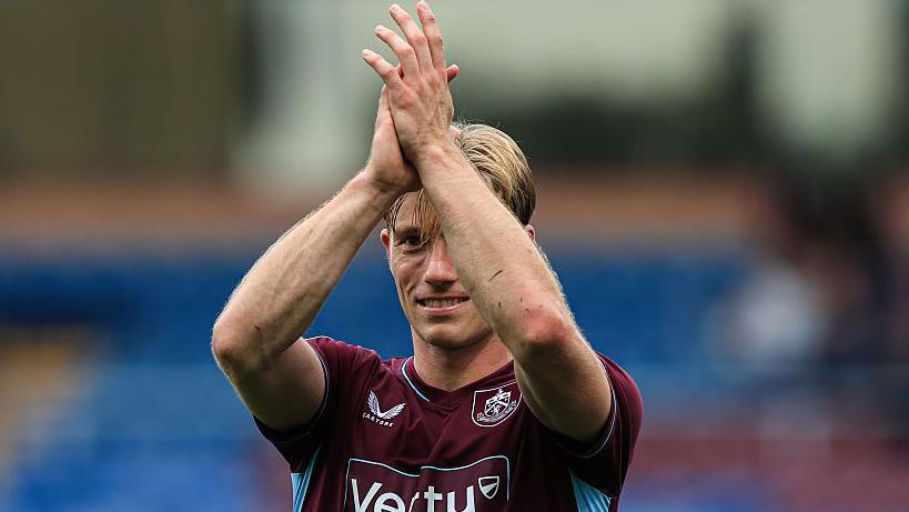 Zian Flemming applauds the Burnley fans after scoring twice against West Ham.