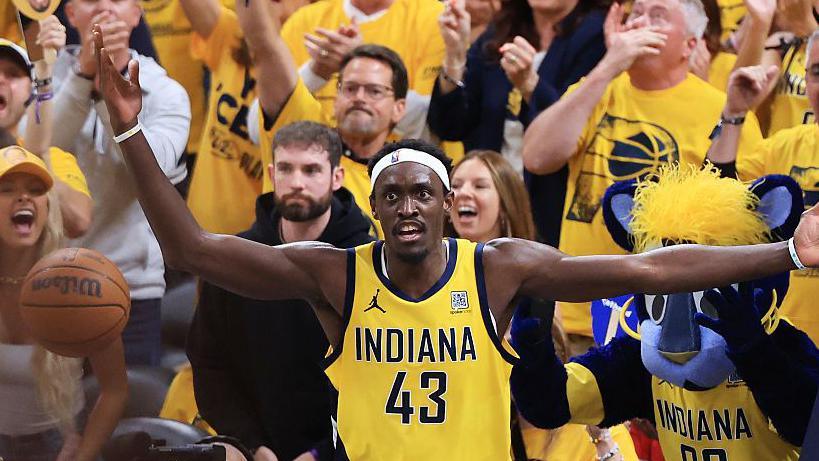 Pascal Siakam in Indiana Pacers kit, with his arms out and a questioning look on his face