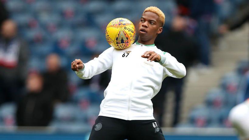 Charly Musonda balancing the ball on his shoulder while at Celtic 