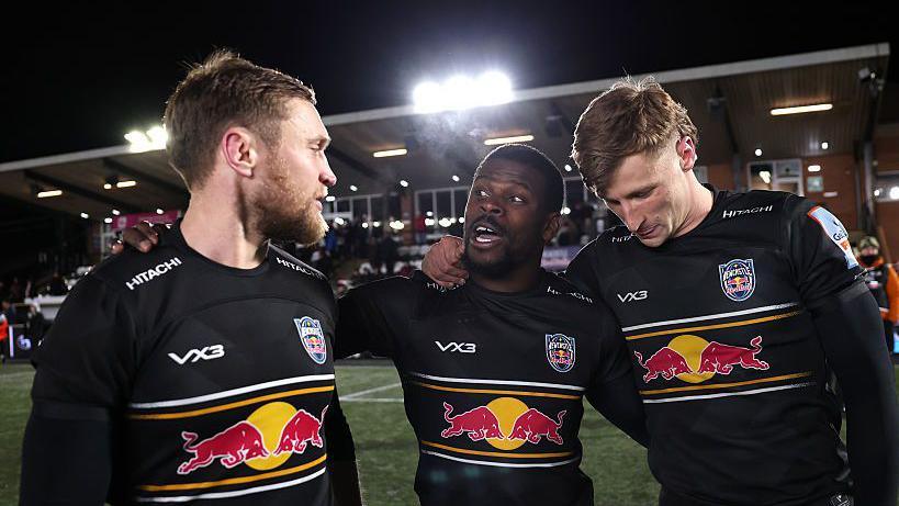 Brett Connon (left) is spoken to by Christian Wade (centre) with Alex Hearle (right), while Wade has an arm round each of them after Newcastle's win over Gloucester 