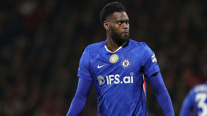 Benoit Badiashile of Chelsea looks on