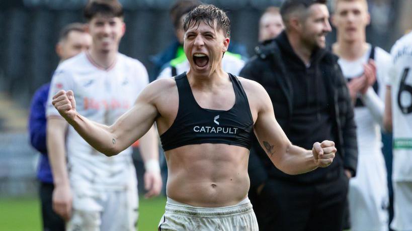 Goncalo Franco celebrates Swansea's win over Blackburn in the spring