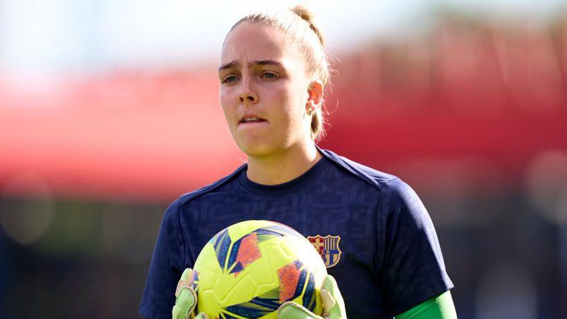 Barcelona goalkeeper Ellie Roebuck with the ball in training