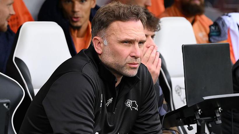 John Eustace in the Derby dugout