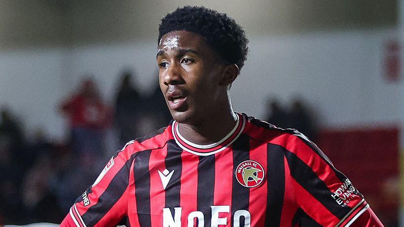 Walsall's Aaron Loupalo-Bi in action