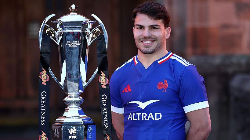 France captain Antoine Dupont, who was named as World Rugby player of the year in 2021, pictured with the 2026 Six Nations trophy