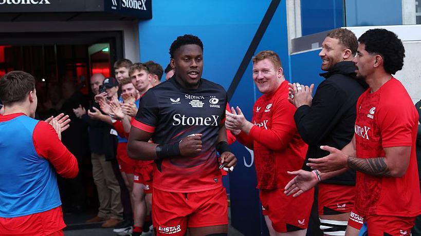 Saracens captain Maro Itoje receiving a guard of honour from his teammates.